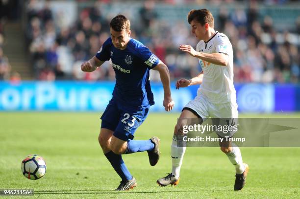 Seamus Coleman of Everton is challenged by Tom Carroll of Swansea City during the Premier League match between Swansea City and Everton at Liberty...