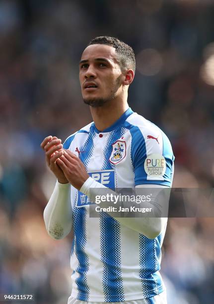 Tom Ince of Huddersfield Town applauds fans after the Premier League match between Huddersfield Town and Watford at John Smith's Stadium on April 14,...