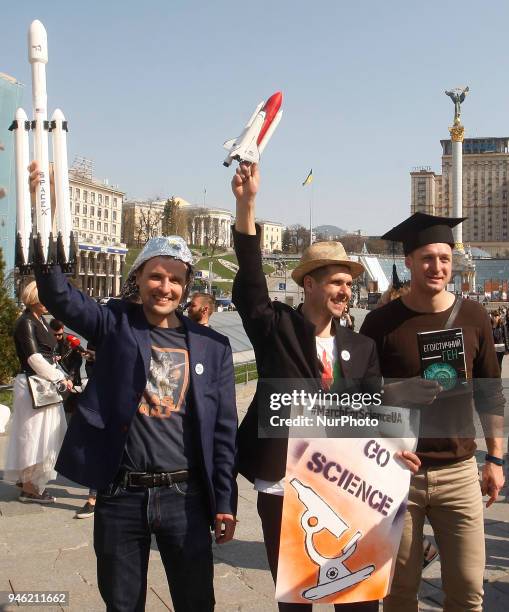 People carry placards reading like &quot;Who you gonna call?&quot;, &quot;We do,what we must,because we can&quot;,&quot;Science is...