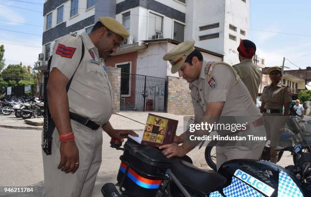 Police officials inspecting the spot where Punjabi Singer Parmish Verma was shot by unidentified men, last night at around 1:30am outside his housing...