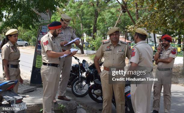 Police officials inspecting the spot where Punjabi Singer Parmish Verma was shot by unidentified men, last night at around 1:30am outside his housing...