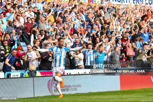 Tom Ince of Huddersfield Town celebrates after scoring a goal to make it 1-0 during the Premier League match between Huddersfield Town and Watford at...