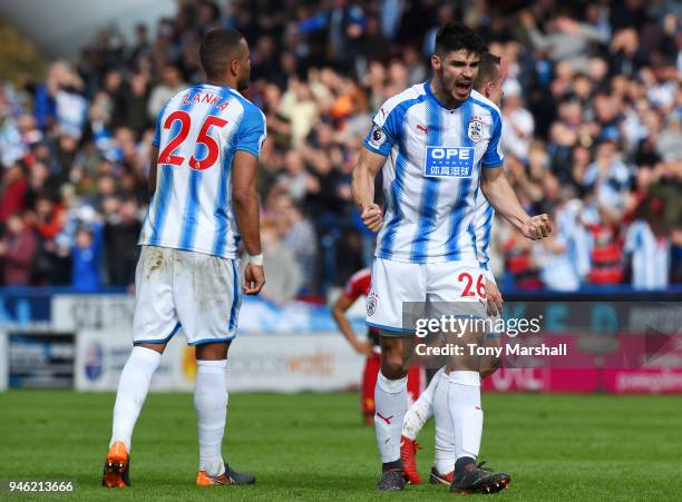 Christopher Schindler of Huddersfield Town celebrates his sides victory after the Premier League match between Huddersfield Town and Watford at John...