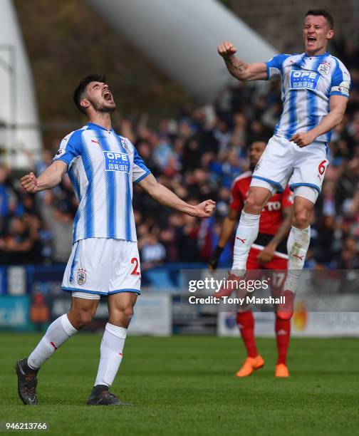 Christopher Schindler of Huddersfield Town and Jonathan Hogg of Huddersfield Town celebrate their sides victory after the Premier League match...