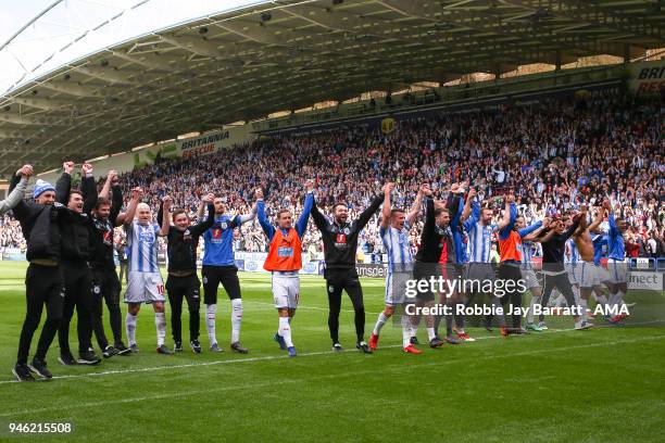 Huddersfield Town players celebrate with the fans at full time during the Premier League match between Huddersfield Town and Watford at John Smith's...