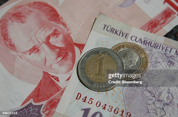 Turkey new lira coins and bills are displayed in London, Wednesday, Feb. 28, 2007.