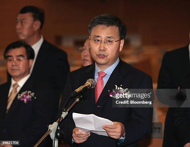 Guo Shuqing, chairman of China Construction Bank Corp., speaks at China Construction Bank's IPO ceremony at Shanghai Stock Exchange at in Shanghai,...
