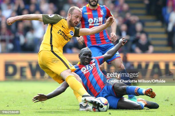 Mamadou Sakho of Crystal Palace slides in to block the shot of Glenn Murray of Brighton during the Premier League match between Crystal Palace and...