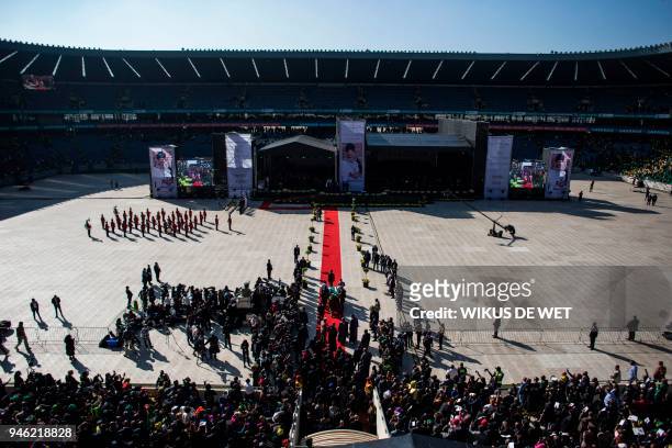 The casket of anti-Apartheid icon Winnie Madikizela Mandela is brought into the Orlando Stadium in the township of Soweto, during her funeral,...