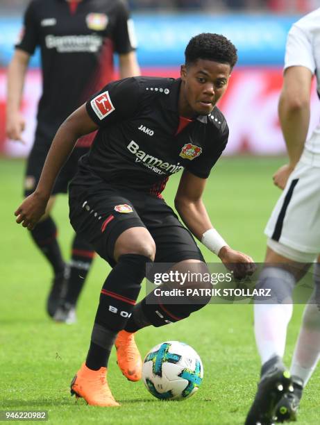 Leverkusen's Jamaican midfielder Leon Bailey vies for the ball during the German first division Bundesliga football match Bayer 04 Leverkusen vs...