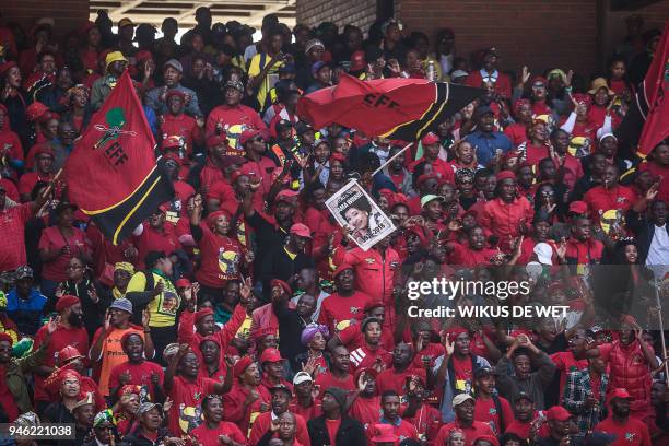 Members of the Economic Freedom Fighters attend the funeral of anti-apartheid icon Winnie Madikizela-Mandela, at the Orlando Stadium in the township...