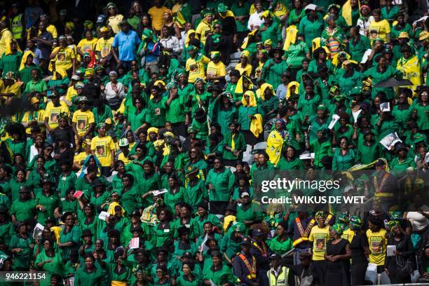African National Congress Women's League members attend the funeral of anti-apartheid icon Winnie Madikizela-Mandela, at the Orlando Stadium in the...