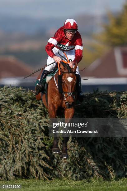 Davy Russell riding Tiger Roll clear the last to win The Randox Health Grand National Handicap Steeple Chase at Aintree racecourse on April 14, 2018...