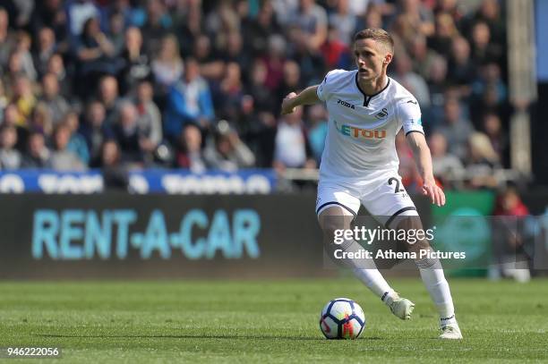 Andy King of Swansea City in action during the Premier League match between Swansea City and Everton at The Liberty Stadium on April 14, 2018 in...