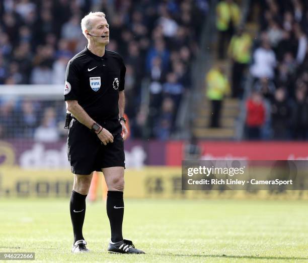 Referee Martin Atkinson during the Premier League match between Burnley and Leicester City at Turf Moor on April 14, 2018 in Burnley, England.