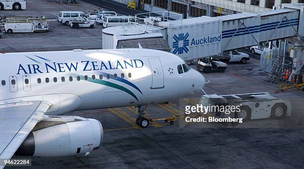 An Air New Zealand plane is parked on the tarmac at Auckland International Airport, in Auckland, New Zealand, on Monday, June 18, 2007. Air New...