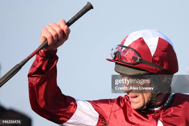 Davy Russell celebrates after riding Tiger Roll to victory during the 2018 Randox Health Grand National at Aintree Racecourse on April 14, 2018 in...