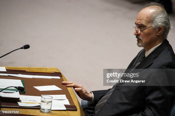 Syrian ambassador to the United Nations Bashar Jaafari attends a United Nations Security Council meeting concerning the situation in Syria, at United...
