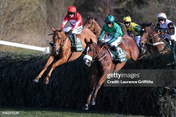 Jamie Bargary riding Double Ross and Daryl Jacob riding Ucello Conti jump Canal Turn during the 2018 Randox Health Grand National at Aintree...