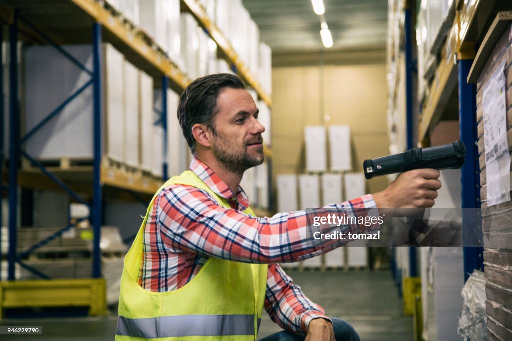 Warehouse Worker Scanning Codes High-Res Stock Photo - Getty Images