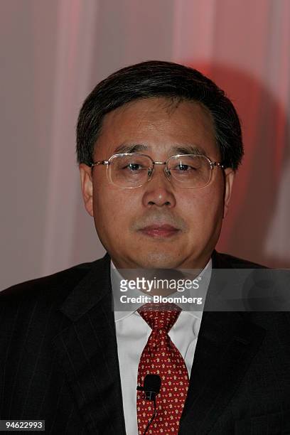 Guo Shuqing, chairman of the China Banking Association and China Construction Bank listens to an address during the China International Banking...