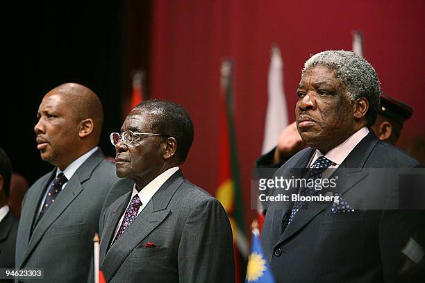 Lesotho's King Letsie III, left, President Robert Mugabe of Zimbabwe, center, and Zambian President Levy Mwanawasa at the opening of the 26th SADC...