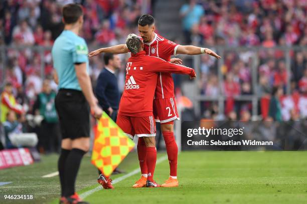 Sandro Wagner of Muenchen celebrates with Rafinha of Bayern Muenchen after he scored a goal to make it 1:1 during the Bundesliga match between FC...