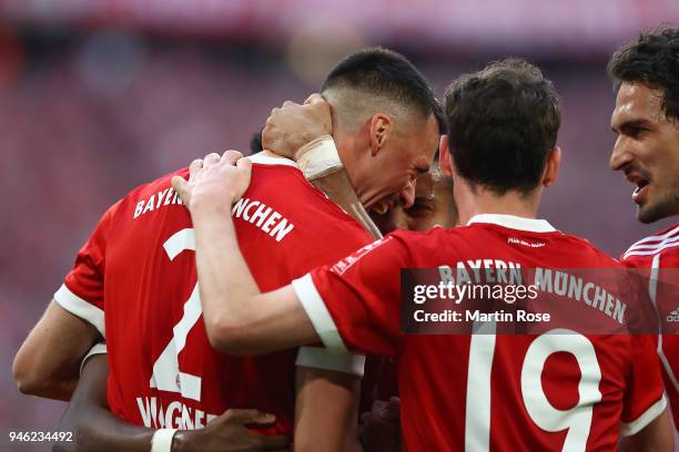 Sandro Wagner of Muenchen celebrates with his team after he scored a goal to make it 2:1 during the Bundesliga match between FC Bayern Muenchen and...