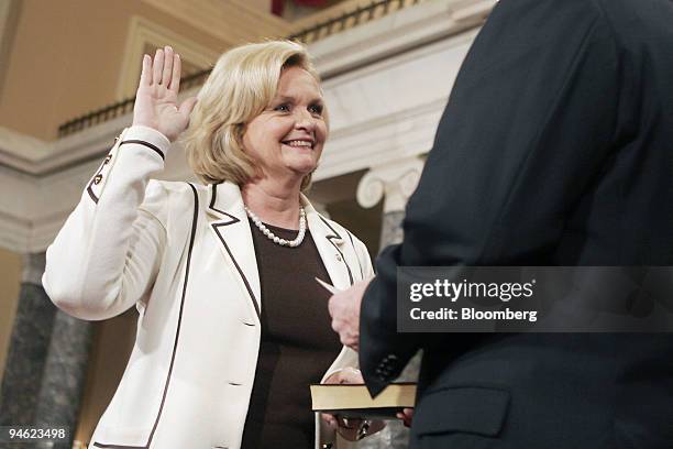 Freshman Senator Claire McCaskill of Missouri participates in a ceremonial swearing-in to the 110th Congress with Vice President Dick Cheney on the...