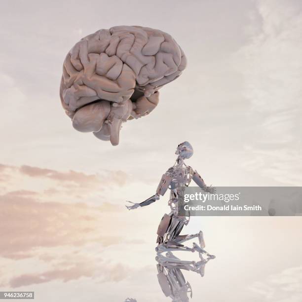 human versus machine: robot supplicates before giant floating human brain - cerebral cortex stock-fotos und bilder