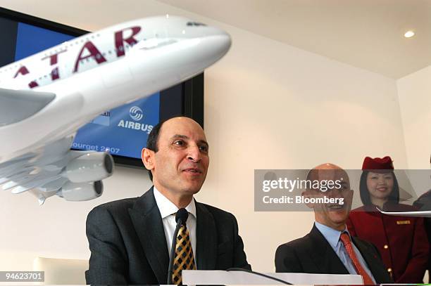 Qatar Airways Chief Executive Officer Akbar Al-Baker, left, speaks during a press conference with Airbus Chief Executive Officer Louis Gallois,...