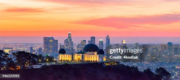 los angeles skyline at dawn panorama and griffith park observatory in the foreground - griffith observatory view stock pictures, royalty-free photos & images