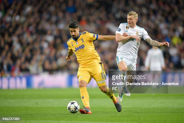 Sami Khedira of Juventus and Toni Kroos of Real Madrid in action during the Champions League match between Real Madrid and Juventus at Estadio...