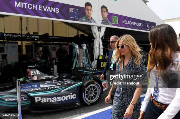 In this handout provided by FIA Formula E, Sienna Miller at Jaguar during the Rome ePrix, Round 7 of the 2017/18 FIA Formula E Series at Circuito...