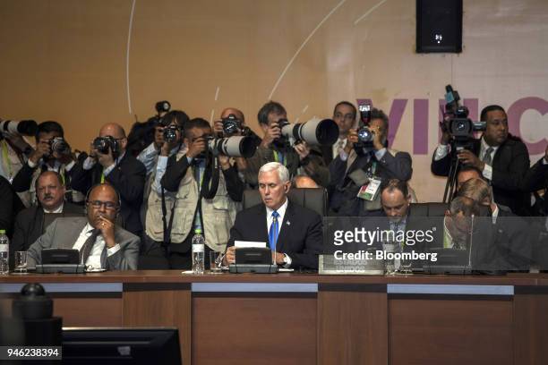 Vice President Mike Pence, center, listens during a plenary session at the CEO Summit of the Americas in Lima, Peru, on Saturday, April 14, 2018. The...