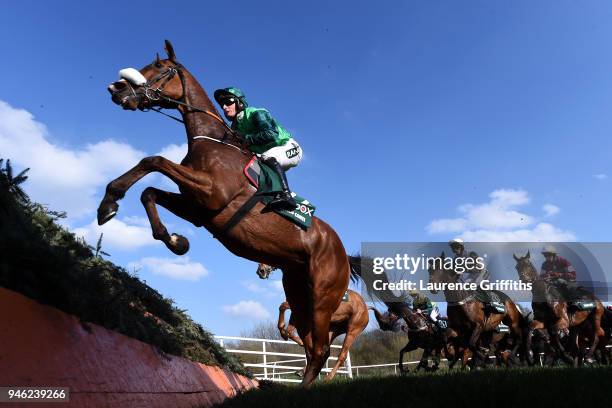 Ucello Conte ridden by Daryl Jacob jumps the Canl Turn during the 2018 Randox Health Grand National at Aintree Racecourse on April 14, 2018 in...