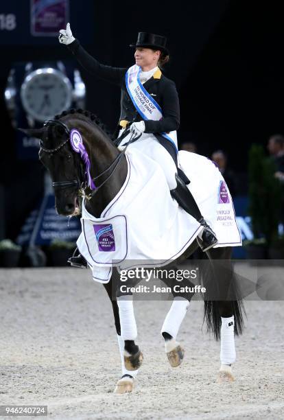 Isabell Werth of Germany celebrates winning the FEI World Cup Dressage Final during the FEI World Cup Paris Finals 2018 at Accorhotels Arena on April...