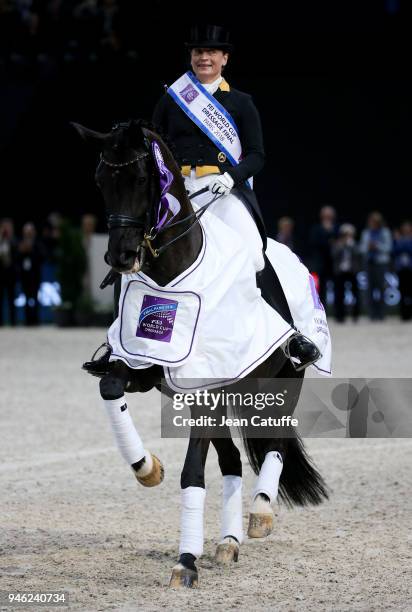 Isabell Werth of Germany celebrates winning the FEI World Cup Dressage Final during the FEI World Cup Paris Finals 2018 at Accorhotels Arena on April...