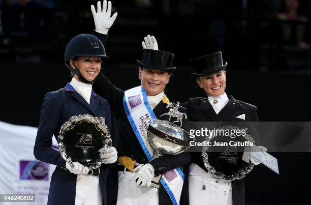 Second Laura Graves of USA , winner Isabell Werth of Germany , third Jessica von Bredow-Werndl during the podium ceremony of the FEI World Cup...