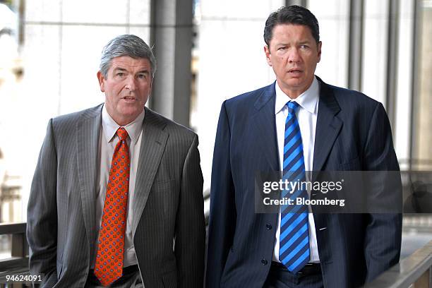 John Taylor, left, and Rod Lindblom, civil attorneys for the family of former actress Lana Clarkson, arrive at Los Angeles Superior Court for the...