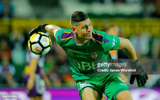 Liam Reddy of the Perth Glory clears the ball from a throw out during the round 27 A-League match between the Perth Glory and the Brisbane Roar at...