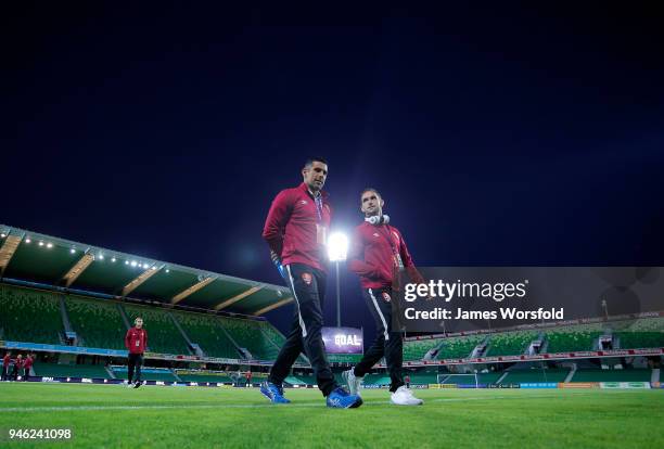 Brisbane Roar players walk back to the change rooms after pitch inspection during the round 27 A-League match between the Perth Glory and the...