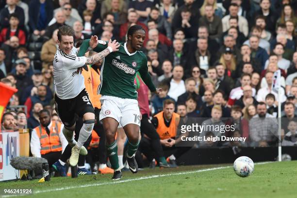 Stefan Johansen of Fulham clashes with Romaine Sawyers of Brentford during the Sky Bet Championship match between Fulham and Brentford at Craven...