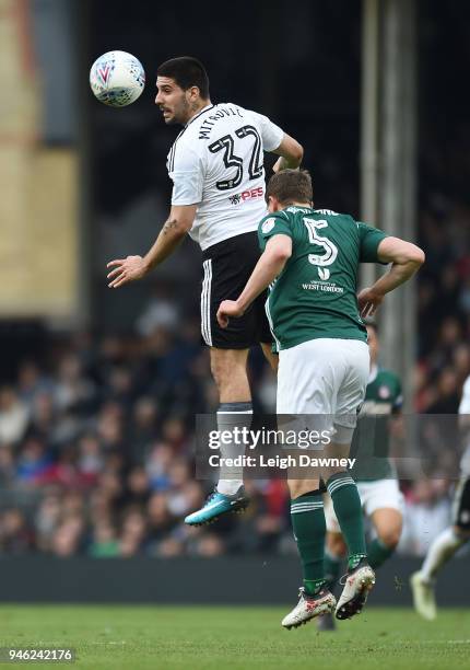 Aleksandar Mitrovic of Fulham heads the ball during the Sky Bet Championship match between Fulham and Brentford at Craven Cottage on April 14, 2018...