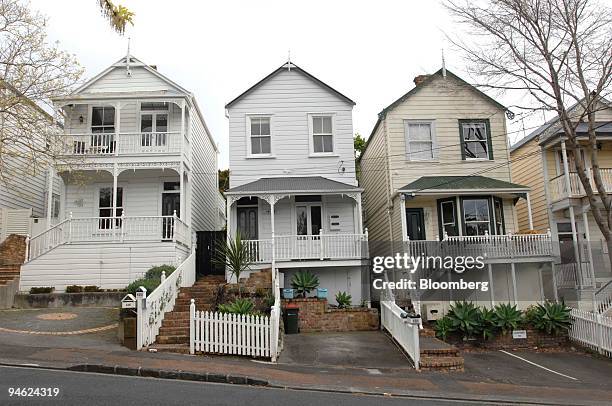 Houses stand in the Herne Bay district of Auckland, New Zealand, on Monday, Sept. 24, 2007. New Zealand's economic growth probably eased in the...