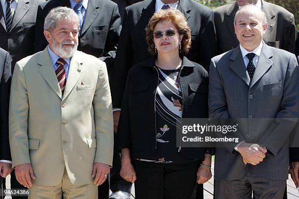 Brazilian President Luiz Inacio Lula da Silva, left, Cabinet Chief Dilma Rousseff, center), and Brazilian Finance Minister Guido Mantega, right,...