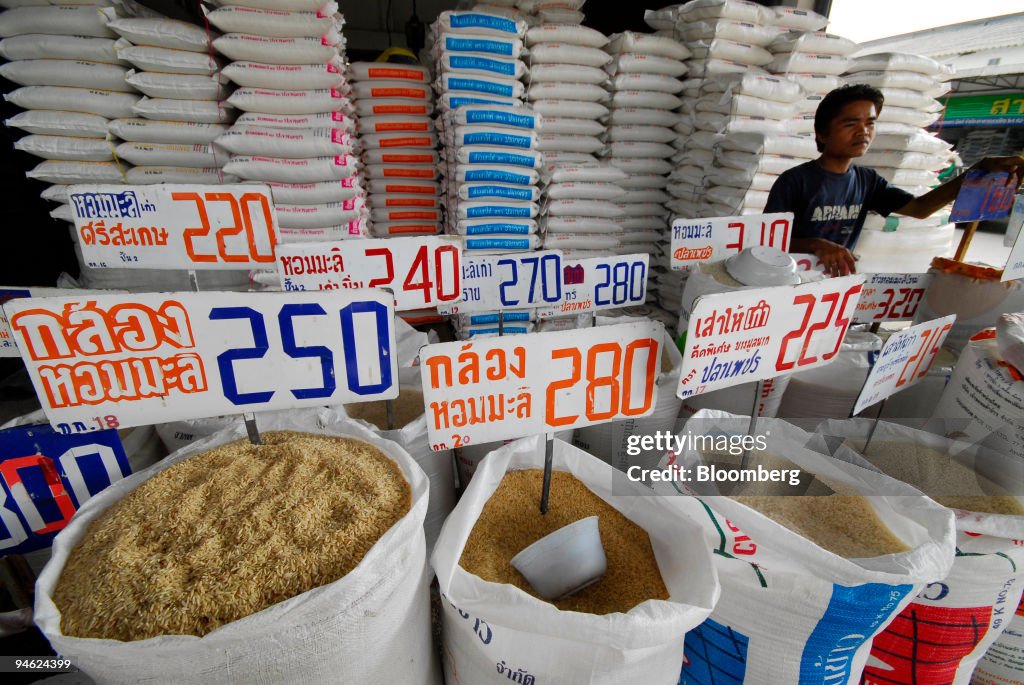 Booth Selling Rice A vendor sells rice at at a shop in a produce market in Nawanakhon ...