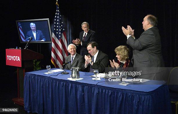 Mississippi Governor Haley Barbour, on the video monitor, joined Toyota Motor Co. Officials and Congressmen to announce Toyota's plan to build a $1.3...