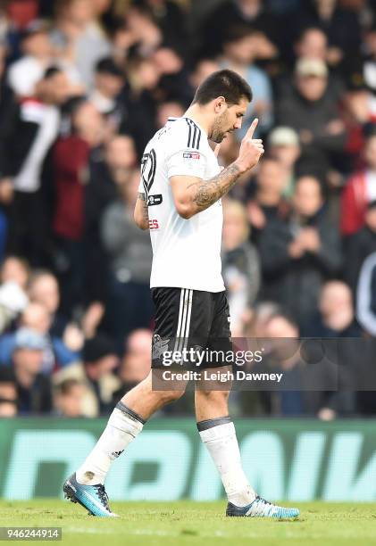 Aleksandar Mitrovic of Fulham scores first during the Sky Bet Championship match between Fulham and Brentford at Craven Cottage on April 14, 2018 in...