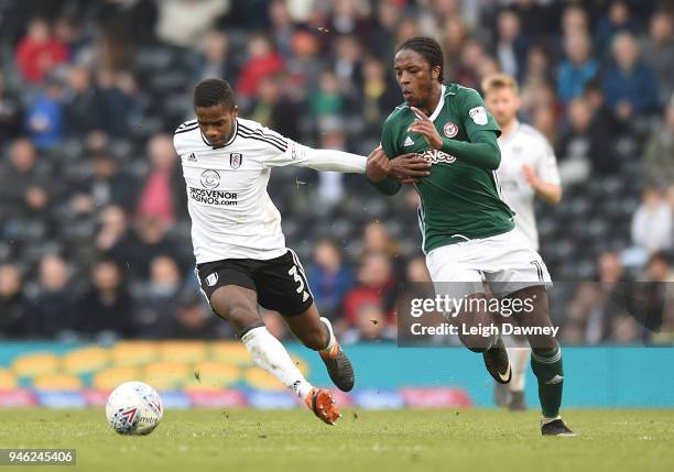 Ryan Sessegnon of Fulham gains possession of the ball against Romaine Sawyers of Brentford during the Sky Bet Championship match between Fulham and...